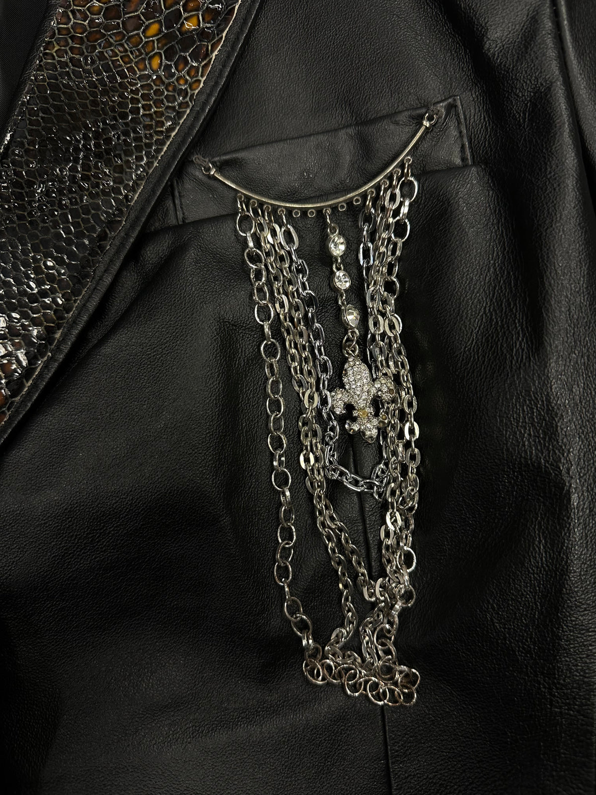 Vintage Leather Jacket with Embossed Lapel and Chain Detailing