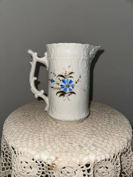 White Pitcher with Blue Flowers