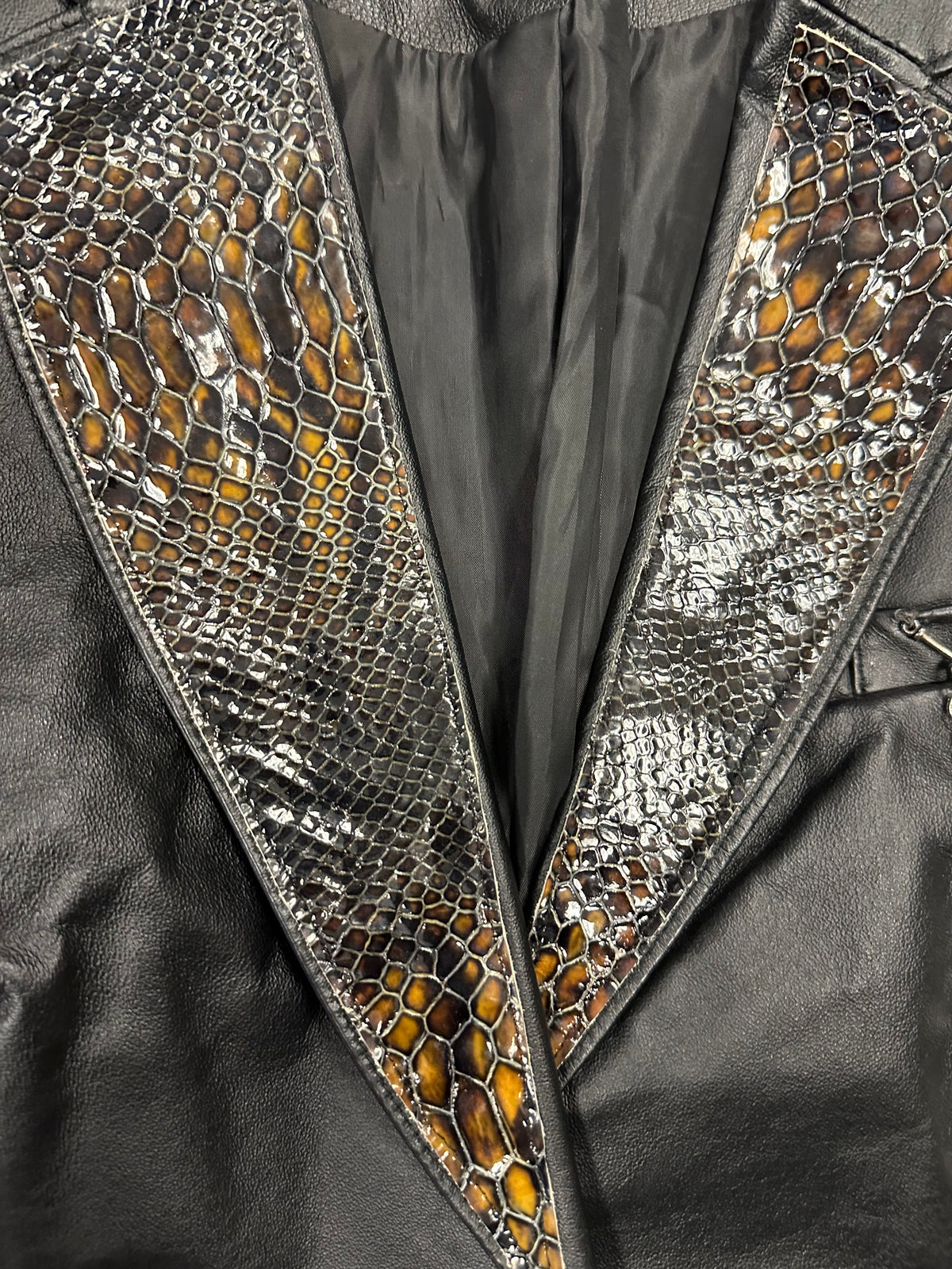 Vintage Leather Jacket with Embossed Lapel and Chain Detailing